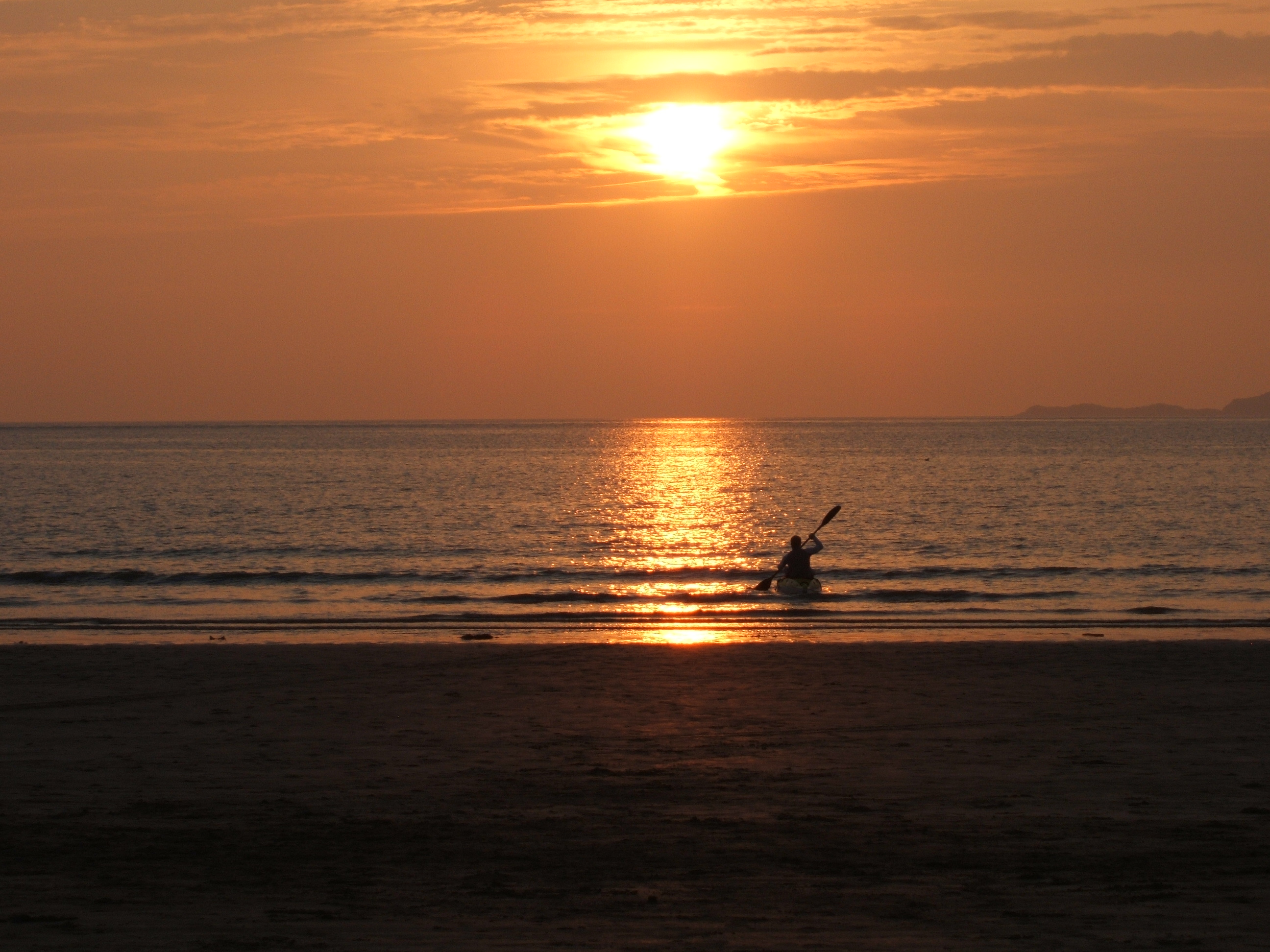 Kayaking into the sunset